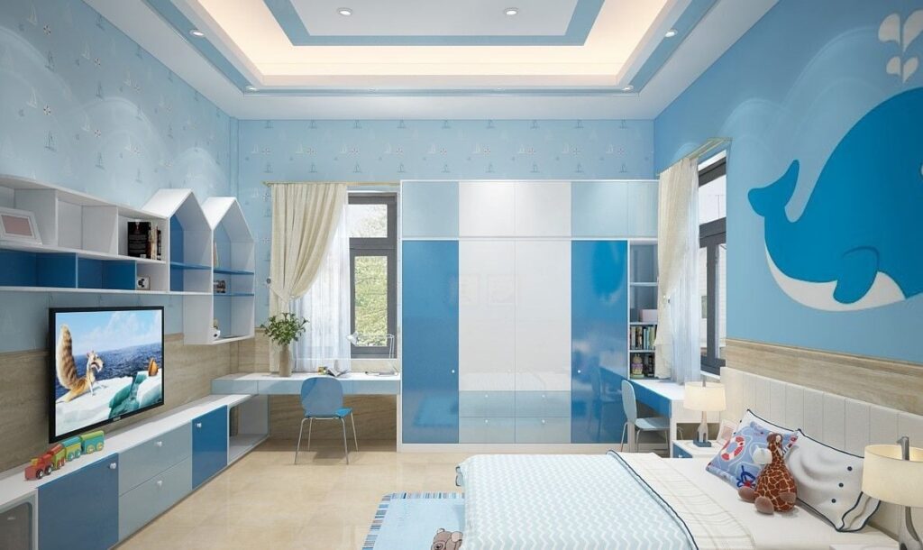 Phòng ngủ trẻ em màu xanh dương với tranh cá voi, nội thất hiện đại, bàn học và giường thoải mái.