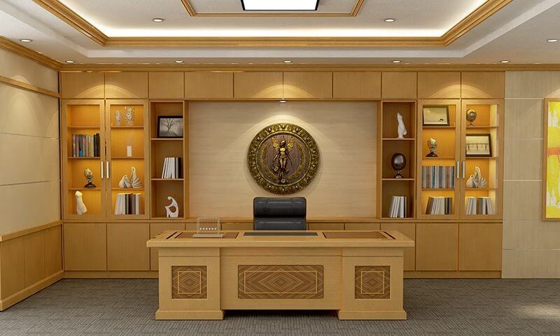 tu-dung-tai-lieu-phong-giam-doc Văn phòng sang trọng với bàn làm việc gỗ, ghế da, kệ sách và trang trí nghệ thuật trên tường.