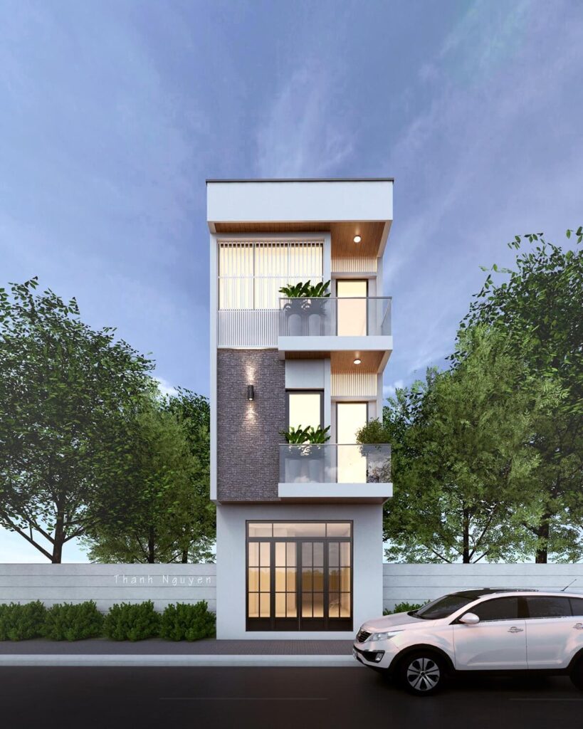 uu-diem-cua-nha-ong-3-tang-5x15m-4-phong-ngu-2-819x1024-1 Nhà phố hiện đại 3 tầng với ban công kính và xe hơi đậu phía trước, bao quanh bởi cây xanh.