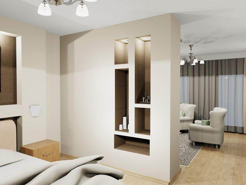 Phòng ngủ hiện đại với vách ngăn trang trí và nội thất màu trung tính, đèn trần sang trọng.