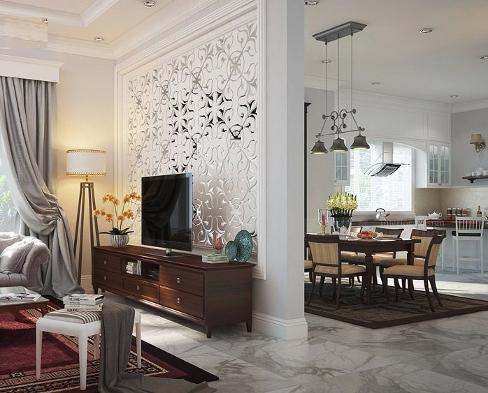 Phòng khách hiện đại với tivi, đèn đứng và vách ngăn hoa văn độc đáo, liền kề phòng ăn.