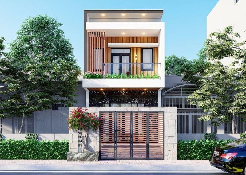 Nhà phố hiện đại hai tầng, thiết kế mở với cửa kính và lan can, cây xanh xung quanh.
