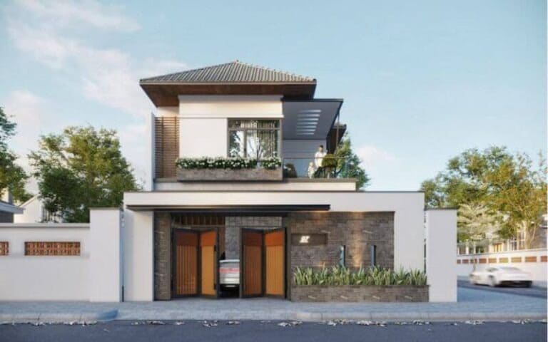 Nhà phố hiện đại hai tầng với gara, cây xanh trước nhà. Trời xanh, môi trường xung quanh yên bình và thoáng đãng.