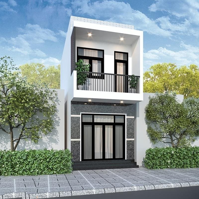 Nhà phố hiện đại hai tầng với thiết kế tối giản, cây xanh trang trí, bầu trời xanh và ánh nắng rực rỡ.