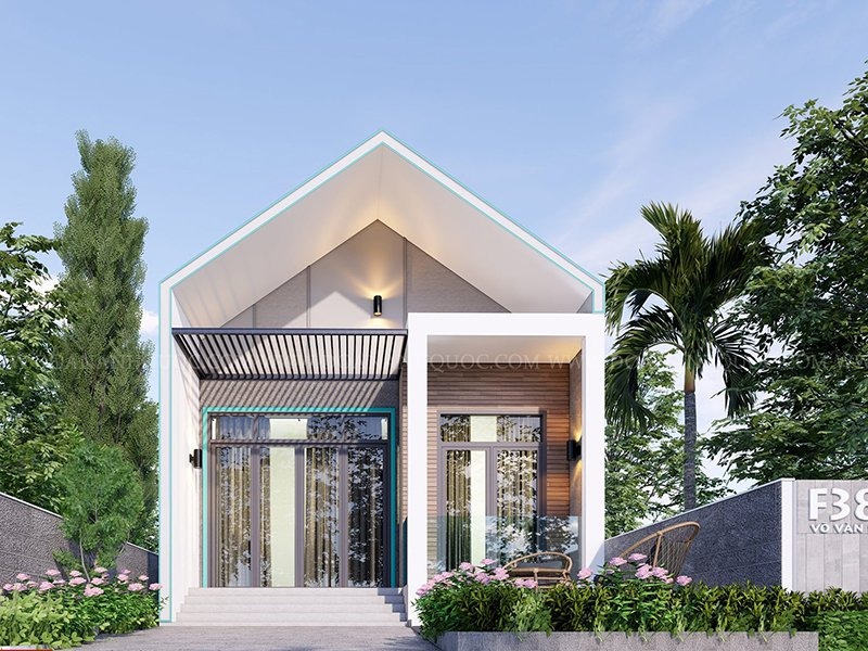Nhà cấp 4 hiện đại với mái chóp cao, cửa kính lớn và cây xanh xung quanh, tạo không gian sống thoáng đãng.
