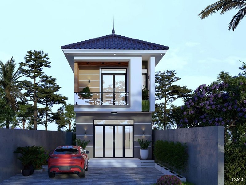 Nhà hai tầng hiện đại với mái ngói xanh, xe ô tô đỏ, cây xanh xung quanh, không gian rộng rãi và thoáng mát.
