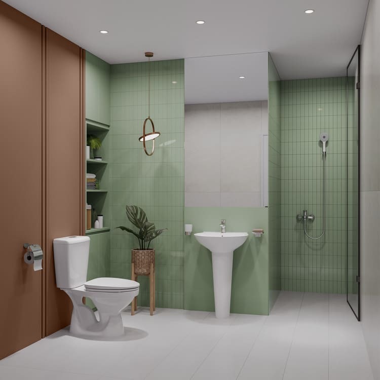 Phòng tắm hiện đại với tường màu xanh lá, bồn vệ sinh, bồn rửa, vòi sen và cây xanh trang trí.