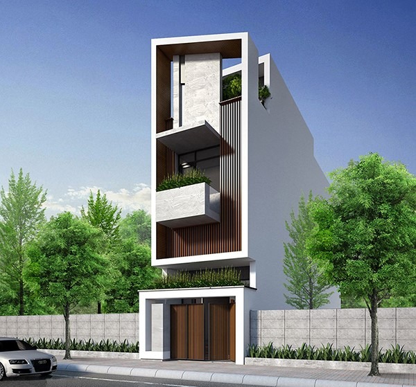 Nhà phố hiện đại với kiến trúc độc đáo, mặt tiền rộng, cây xanh xung quanh, bầu trời xanh tươi sáng.