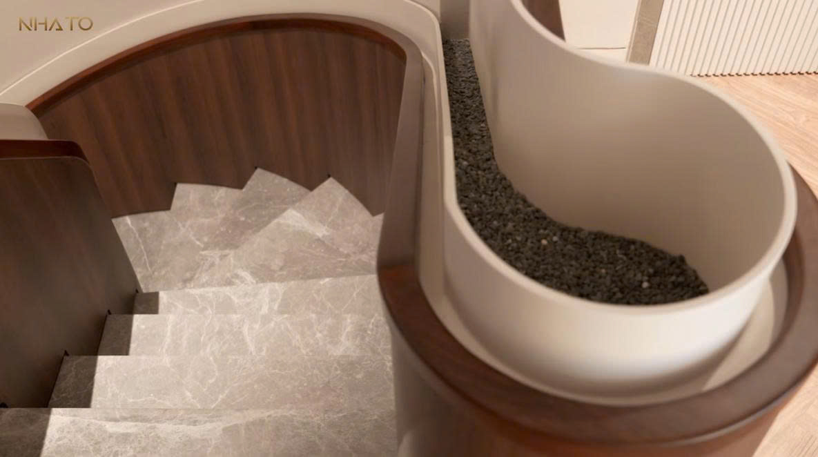 z6640984910723_8bb0c4743c93d590bbfcb48b39827bac Cầu thang xoắn ốc có lan can gỗ và phần trang trí sỏi đen, thiết kế nội thất hiện đại, màu sắc nhẹ nhàng.